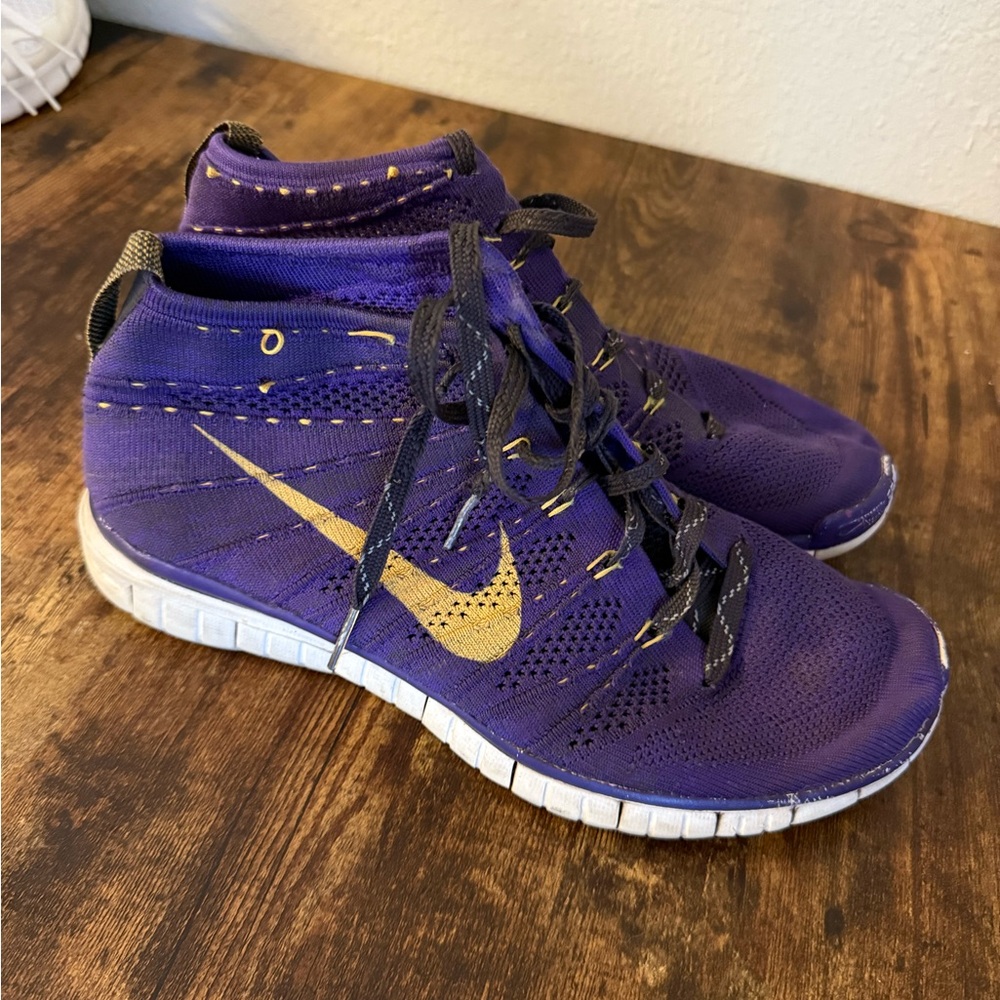 Nike men’s  Purple and Gold Athletic Shoes
